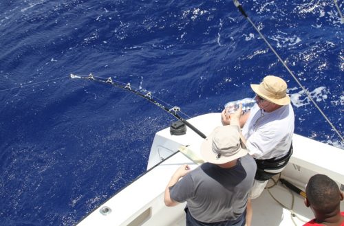 Gégé 75 years old on stand up with a 100kg blue marlin - Rod Fishing Club - Rodrigues Island - Mauritius - Indian Ocean