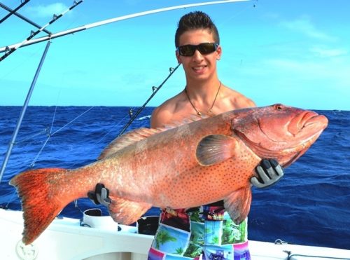 Julien and his nice red coral trout on jigging - Rod Fishing Club - Rodrigues Island - Mauritius - Indian Ocean