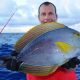 Bruno and his surgeon fish on bottom fishing - Rod Fishing Club - Rodrigues Island - Mauritius - Indian Ocean