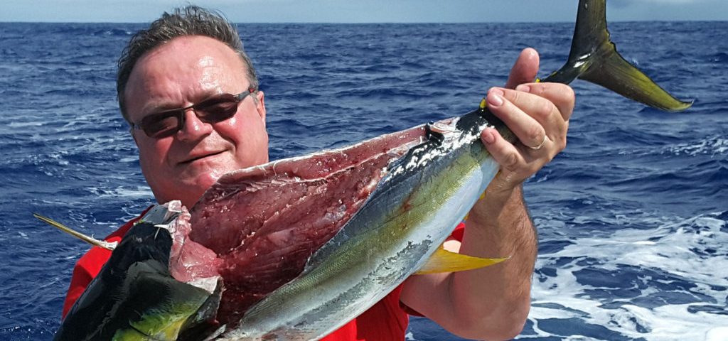 Cutting Yellowfin Tuna for Pierre - Rod Fishing Club - Rodrigues Island - Mauritius - Indian Ocean